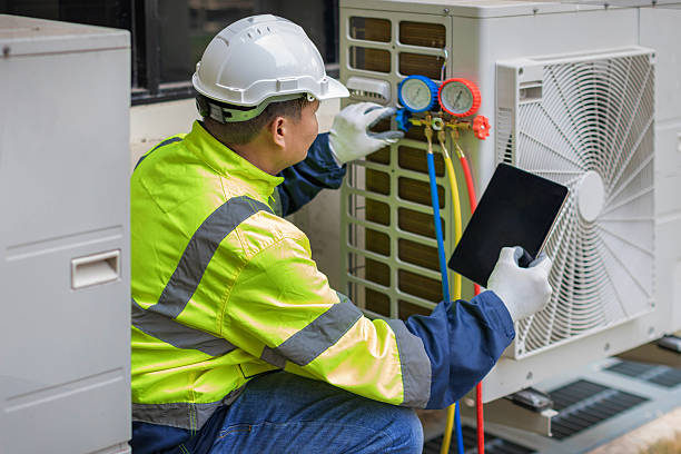 Professional Hvac technician working in Center Cross, VA